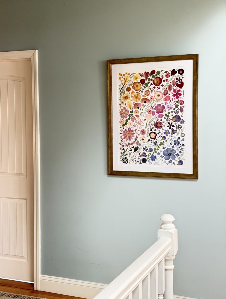 Rainbow Garden pressed flower art commission, 28 by 36 inches framed, hanging on a wall
