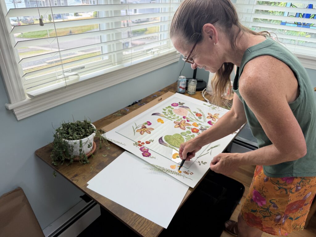 artist gretchen tenbrook working on floral bouqet preservation